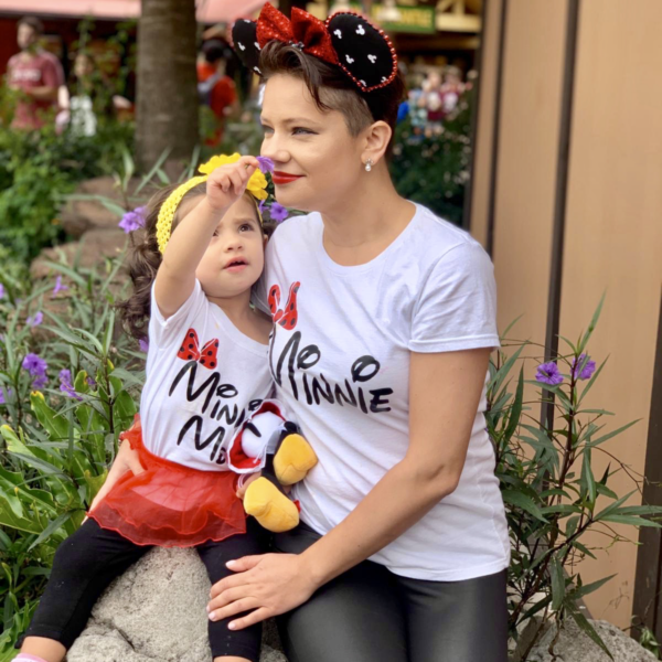 Anna Razhova with her daughter at Disney World
